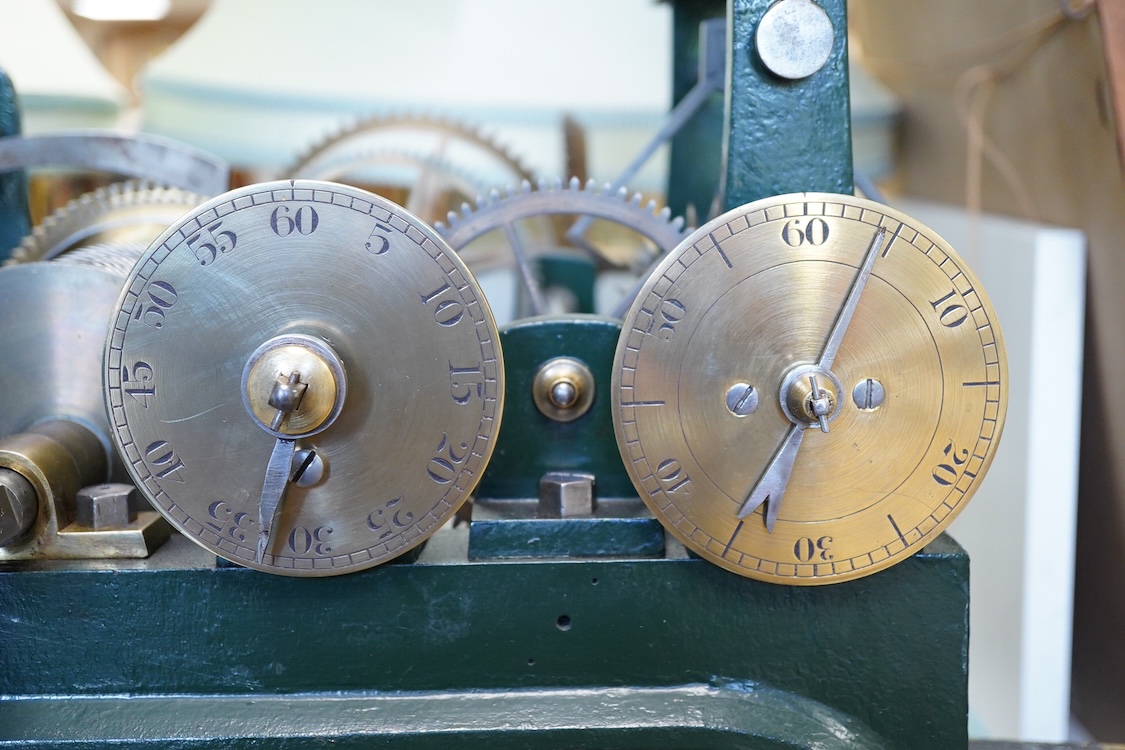 A late 19th century turret timepiece, understood to have been possibly built by Kemp of Bristol, green painted cast iron frame, with pendulum, weight, winding handle, and other unrestored parts, including the drive mecha